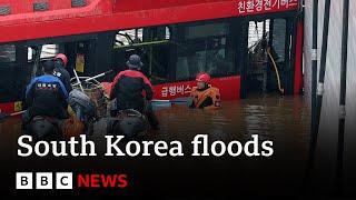 South Korea floods: Dozens die in flooded tunnel and landslides - BBC News