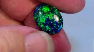 Green fiery opal triplet