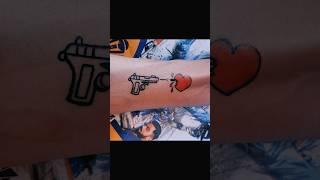 gun shooting heart temporary tattoo design with pen #tattoo #ytshorts