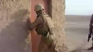 Marine Kicking Down Door