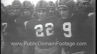 Coach Terry Brennan leads the 1954 Notre Dame football Spring training archival stock footage