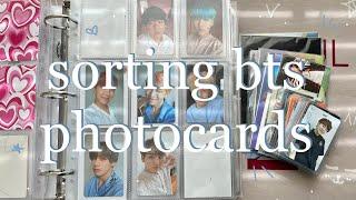 putting away bts photocards  10