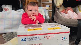 nlovewithreborns2011 is live opening a package from Alaska & Changing reborn baby dolls