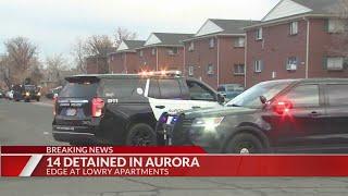 14 detained in home invasion at Aurora apartment