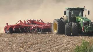 john deere 8370r harrowing of a corn field. harrow BDP 4000