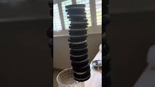 12 Super Mario Oreos balanced on a glass of milk