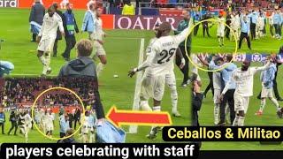 Real Madrid staff celebrating with the players