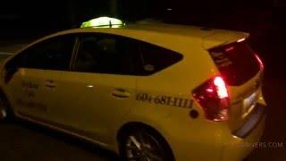 Yellow Cab Car Drives Through a Public Park