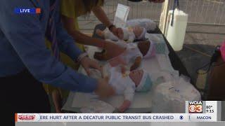 WCIA 3's Amanda Brennan, Seth Bohnhoff try the diaper change challenge