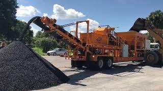 Olympus PG200 pugmill system by PavementGroup shown producing cold mix asphalt in NJ 518-218-7676