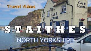 Staithes North Yorkshire Yorkshire coast. Captain Cooks Village female traveller Visit England