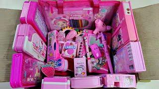 Box full of cute pink stationery items, pencil box, boxing pen, retractable eraser, colour kit, toy