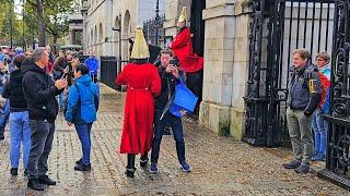 IDIOT BLOCKS THE GUARD - BUT NOT FOR LONG. HAVE THINGS CHANGED IN A YEAR at Horse Guards?