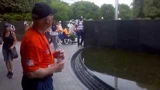 Robert Russ saluting his fellow soldiers at the Korean War Memorial in Washington, DC