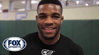 Wrestler Jordan Burroughs rips phone book in half