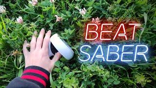 Playing Beat Saber while Touching Grass