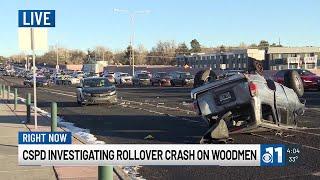 Colorado Springs Police investigating a rollover crash on Woodmen