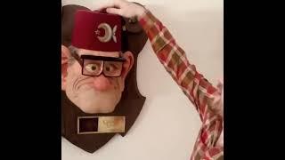 Alex Hirsch inspects the Realistic Stan head!