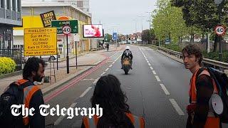 Moment motorcyclist rams past Just Stop Oil protesters blocking the road