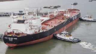 YaSa Golden Horn getting help from 2 tugs