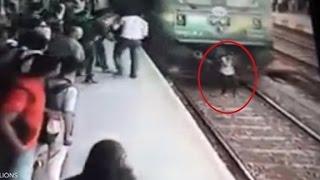 Distracted woman gets run over by train