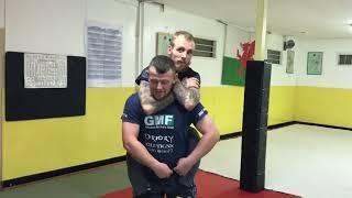 How to escape a rear choke in seconds