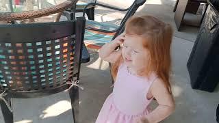 The grands see the pool slide for first time.