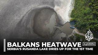 Serbia's Rusanda Lake dries to a pond as the Balkans swelters in a heatwave