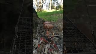 Cooking burgers in the woods