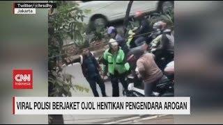 Polisi Berjaket Ojol Hentikan Pengendara Arogan