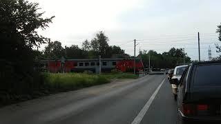 Electric train at a railway crossing