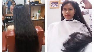 Crazy or genius? Long haired girl at the barber shop