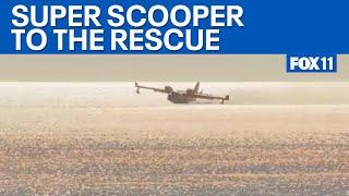 California Fires: Super Scooper picks up water to fight Palisades fire