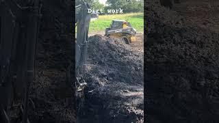 Building a dam #johndeere #dirtwork #excavation #dozer #skidsteer