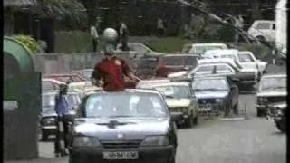 Goderdzi Makharadze climbs up the railway pole heading the soccer ball same time