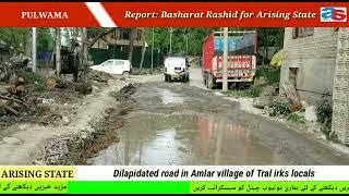 Dilapidated road in Amlar village of Tral irks locals