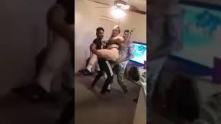 Foreign Russian girl dancing with 3 boys in hotel room