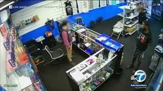 Video shows wild shootout with guard at Compton smoke shop that led to robbery suspect's death