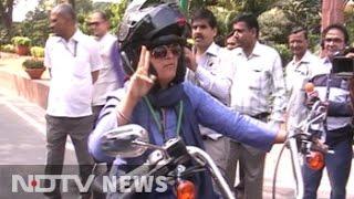 Congress lawmaker Ranjeet Ranjan rides into Parliament on a Harley