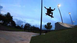 SKATEBOARDER OLLIES MASSIVE GAP ON A LONGBOARD!