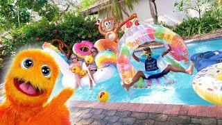 Swimming Pool SPLASH FUN!  Giant Inflatable floats in pool and water slide!