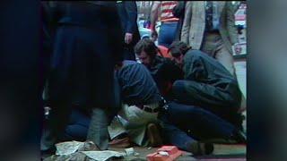 File footage: A chaotic scene following the 1981 assassination attempt on President Ronald Reagan