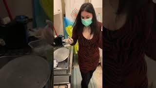 Cooking in tight latex gloves and leather boots