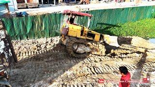 Incredible! Small Bulldozer Stuck In Deep Mud Pulling Out By Dump Trucks