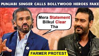 Famous Punjabi Singer INSULTS Ajay Devgn For His Tweet On Farmer Protest, Suniel Shetty CLARIFIES