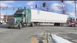 1 hurt after car and semi collide in Austintown