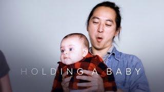 Holding a Baby for the First Time in Slow Motion | First Takes | Cut