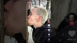 This man is french kissing a tree 