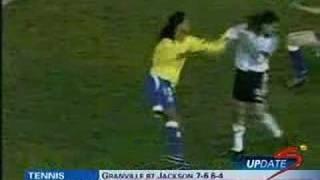 Ronaldinho slaps Sorin for nutmegging him.