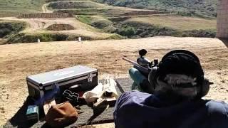 Michael Cantor .220 Swift, 55 gr. Vmax on a water bottle at about 3850 fps